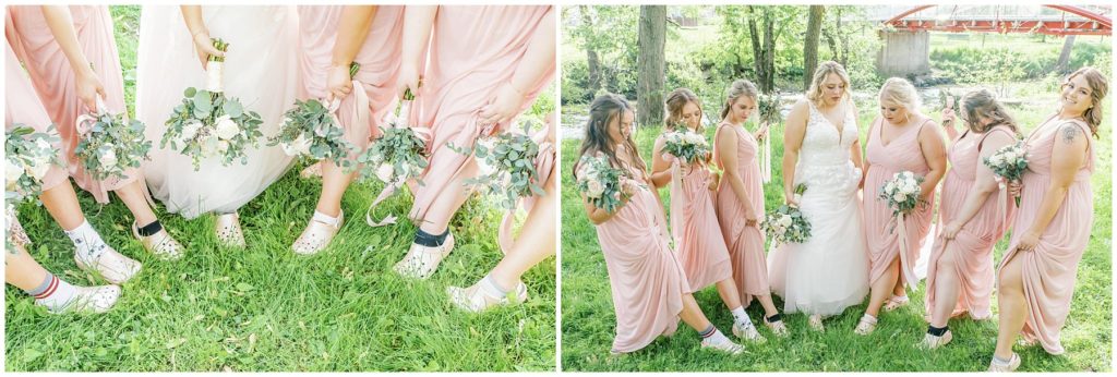 bride showing off crocks with her bridesmaids