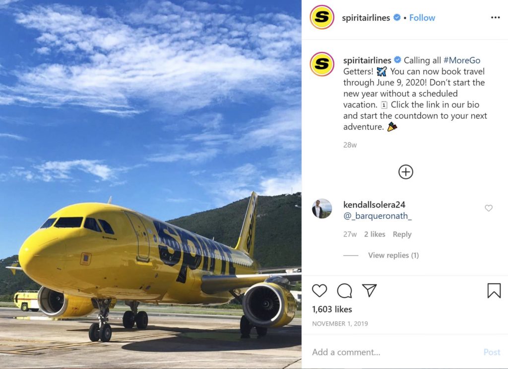 spirit airlines instagram image with yellow plane sitting on tarmac