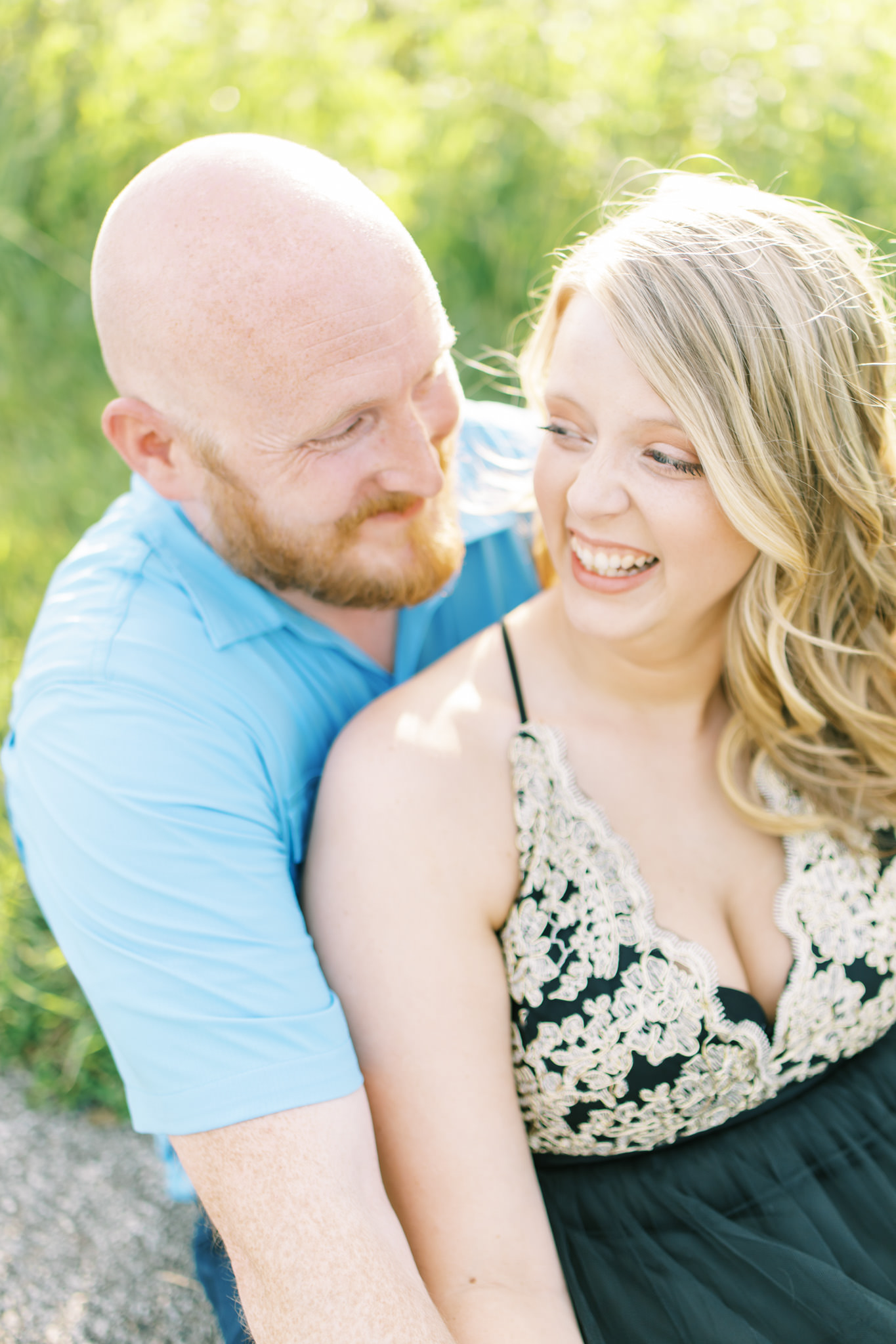 man and woman sitting together at celery bog west lafayette indiana engagement session