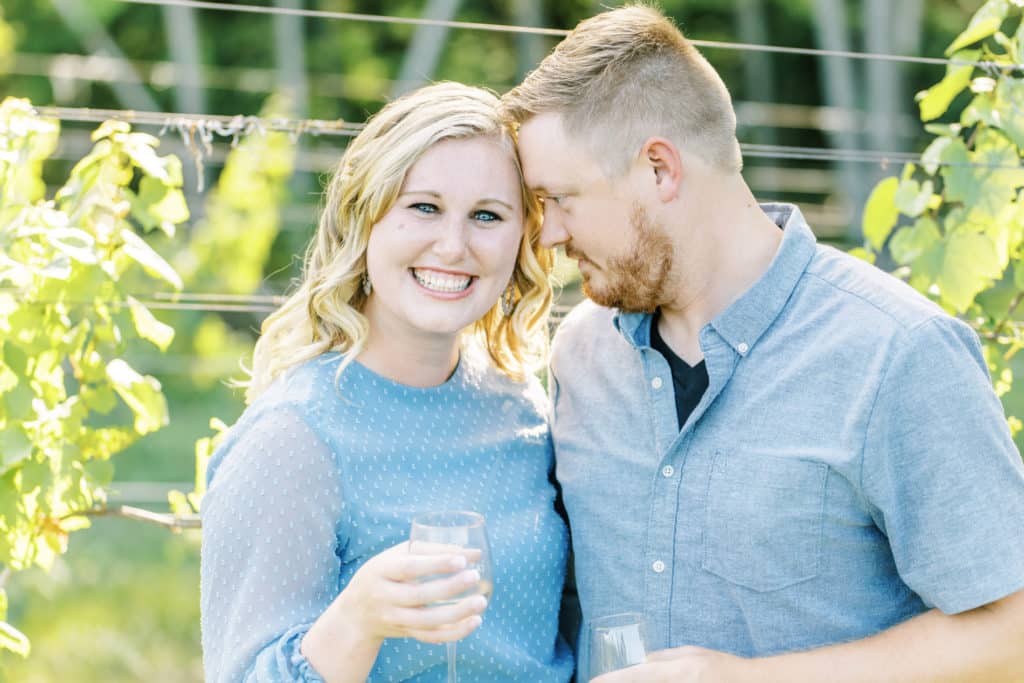 laughing couple drinking wine 