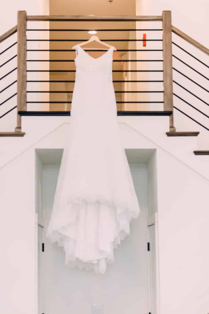 wedding dress hanging in new journey farms