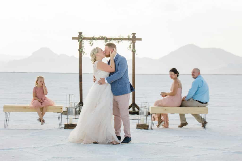 salt flats bride and groom first kiss