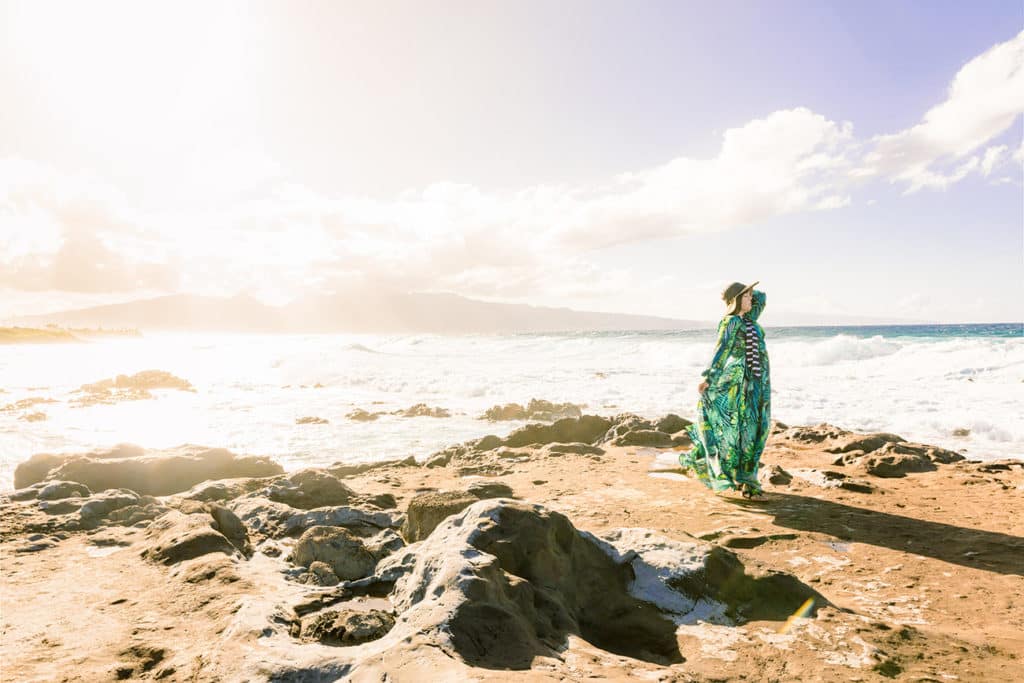 woman standing on beach in oahu