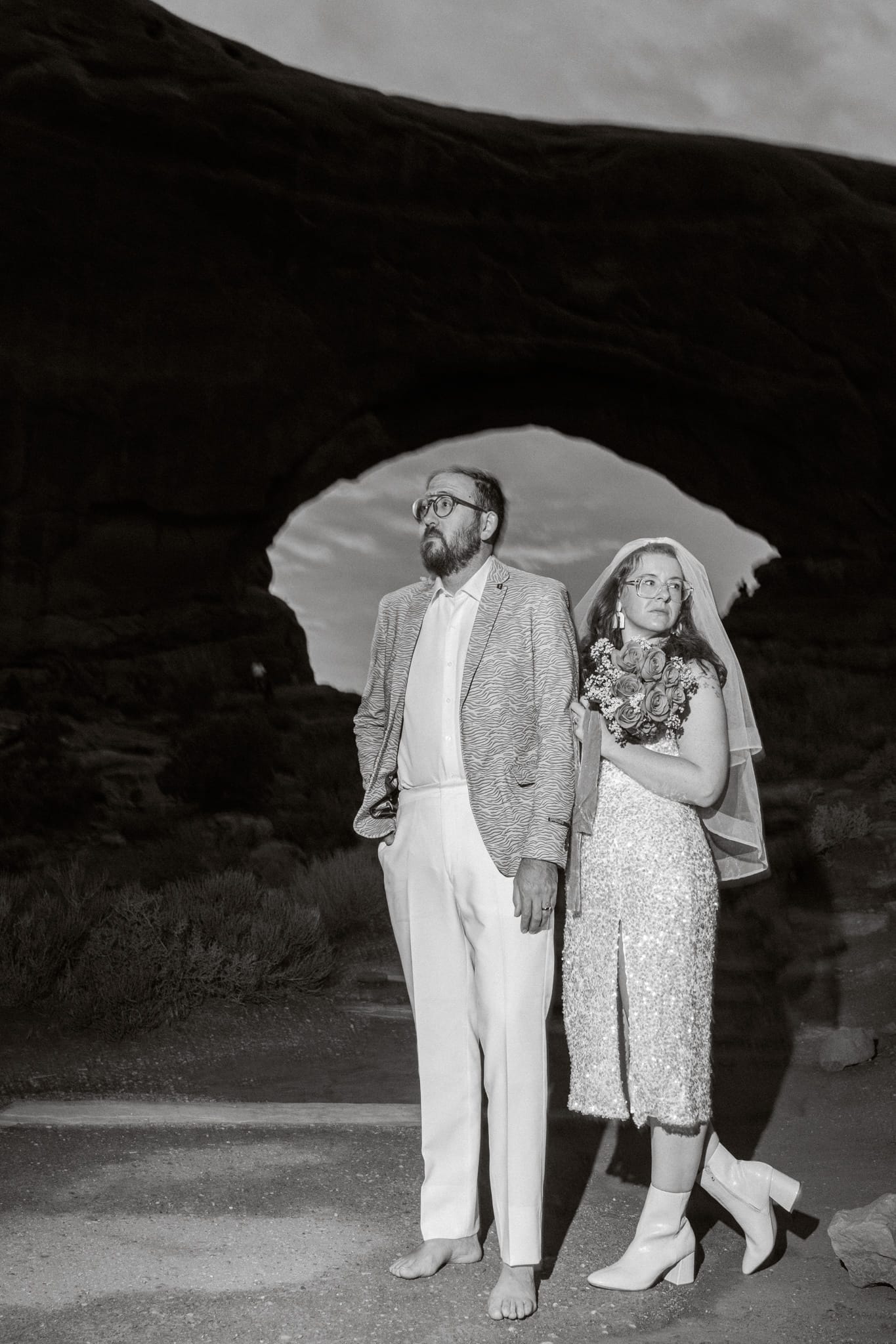 bride and groom at arches national park